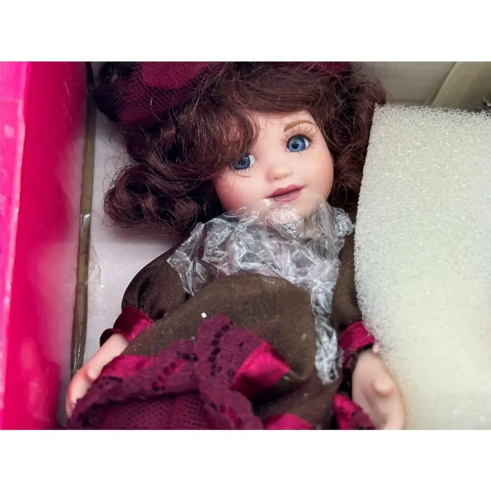 Marie Osmond Fine Porcelain Collector Doll - Raspberry Swiss Chocolate Turtle